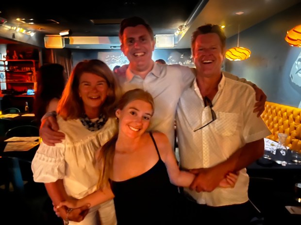 Megan, Peyton and Dave Heine celebrate Beaumont's Neighborhood Eatery's 20 year anniversary in 2025 alongside Gavin McManes (middle, back), who worked there for a decade. Megan, Peyton and Dave are all involved with Brockton Villa Restaurant as well. (Provided by Megan Heine)