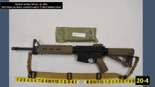 This photo evidence from Larry Millete's preliminary hearing, shows one of the firearms that police seized from his home.