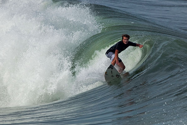 A surfer rides a wave in Manasquan.