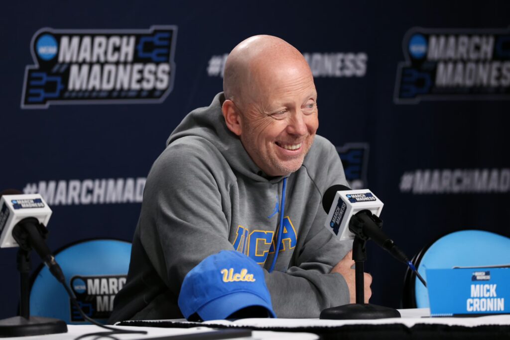 Mar 19, 2026; Philadelphia, PA, USA; UCLA Bruins head coach Mick Cronin speaks with the media before a practice session ahead of the first round of the men's 2026 NCAA Tournament at Xfinity Mobile Arena. Mandatory Credit: Bill Streicher-Imagn Images