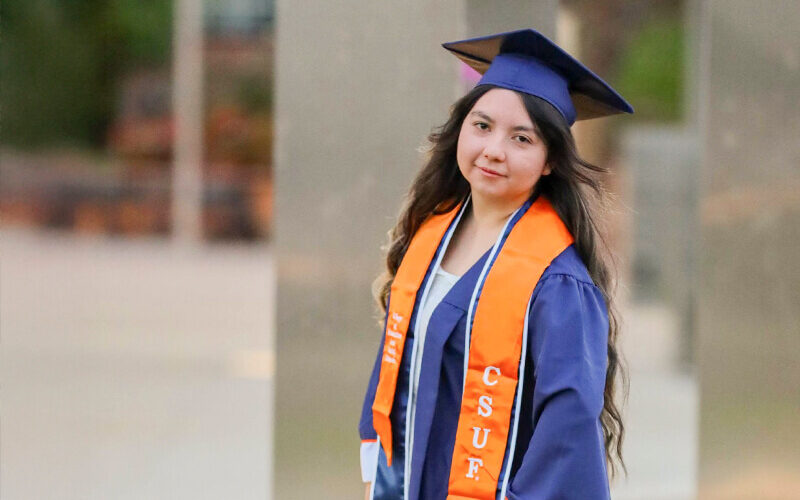 Portrait of Miranda Garcia in graduation regalia
