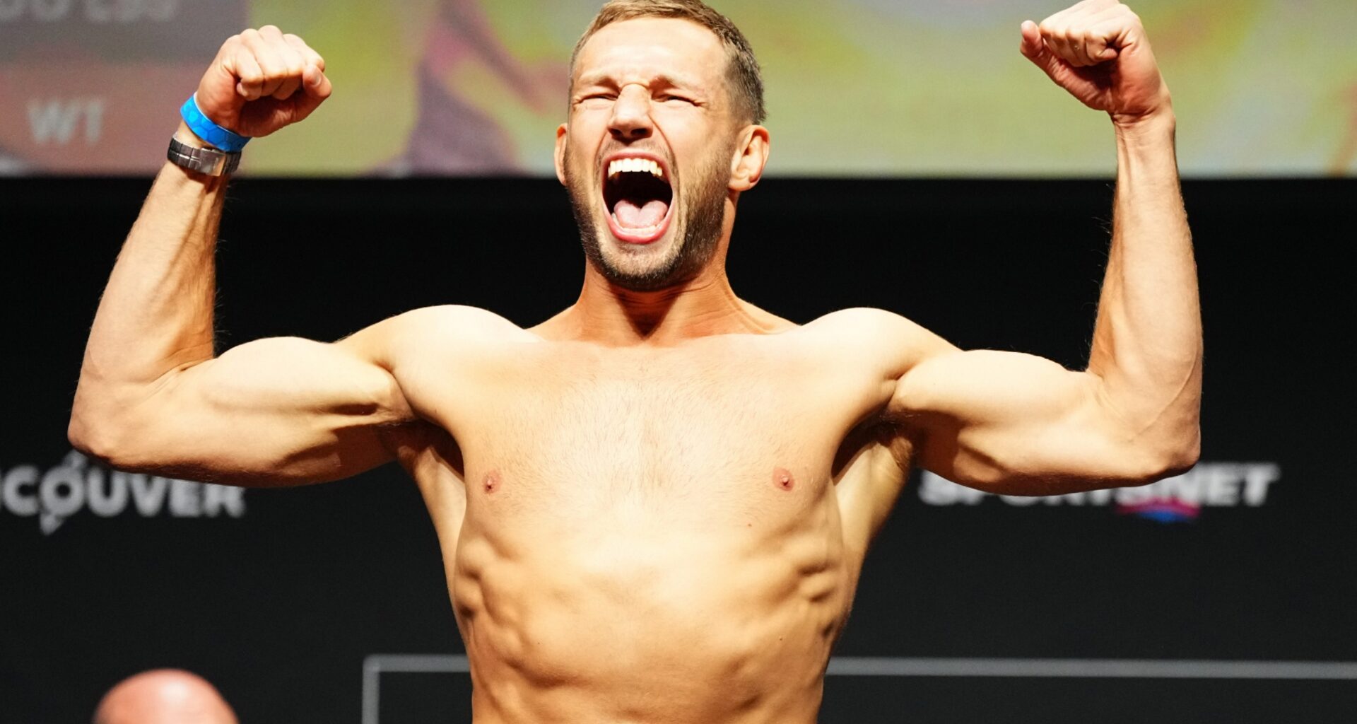 Reinier de Ridder poses on the scale at the UFC Vancouver ceremonial weigh-in