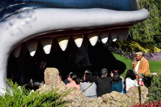 Visitors at Disneyland head inside a whale on the Storybook Land Canal Boats in Fantasyland at Disneyland in Anaheim, CA, on Thursday, Dec 5, 2019. (Photo by Jeff Gritchen, Orange County Register/SCNG)