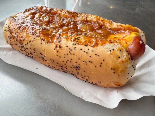 The Jumbo Chili Cheese Dog at Portillo's in Buena Park comes with a steamed poppy seed bun, beef chili and a slice of American cheese. (Photo by Brock Keeling, Orange County Register/SCNG)