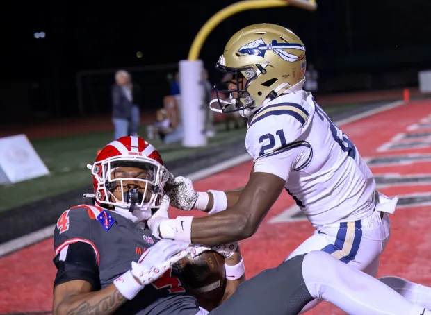 Mater Dei wide receiver Kayden Dixon-Wyatt, left, catches a pass in the end zone in front of St. John Bosco defensive back Jashaun Shaffer but lands out of bounds for an incomplete pass in the CIF-SS Division 1 championship football game in Long Beach on Friday, Nov. 29, 2024. (Photo by Paul Rodriguez, Contributing Photographer)