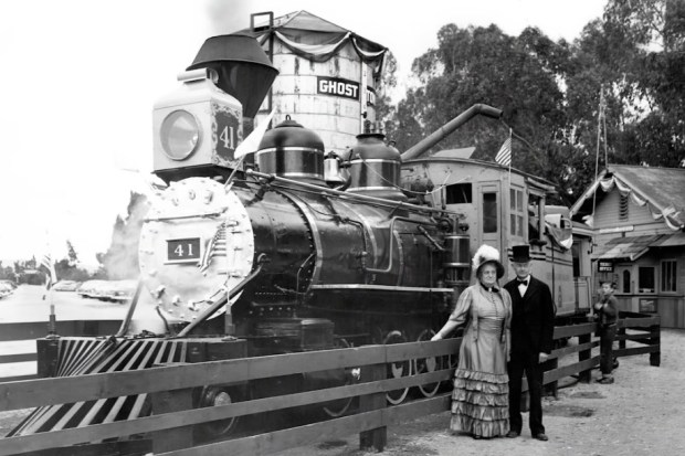 Cordelia and Walter Knott with Locomotive 41 at the gold spike ceremony for the Ghost Town & Calico Railroad in 1952 at Knott's Berry Farm. (Courtesy of Orange County Archives/Knott's Berry Farm)