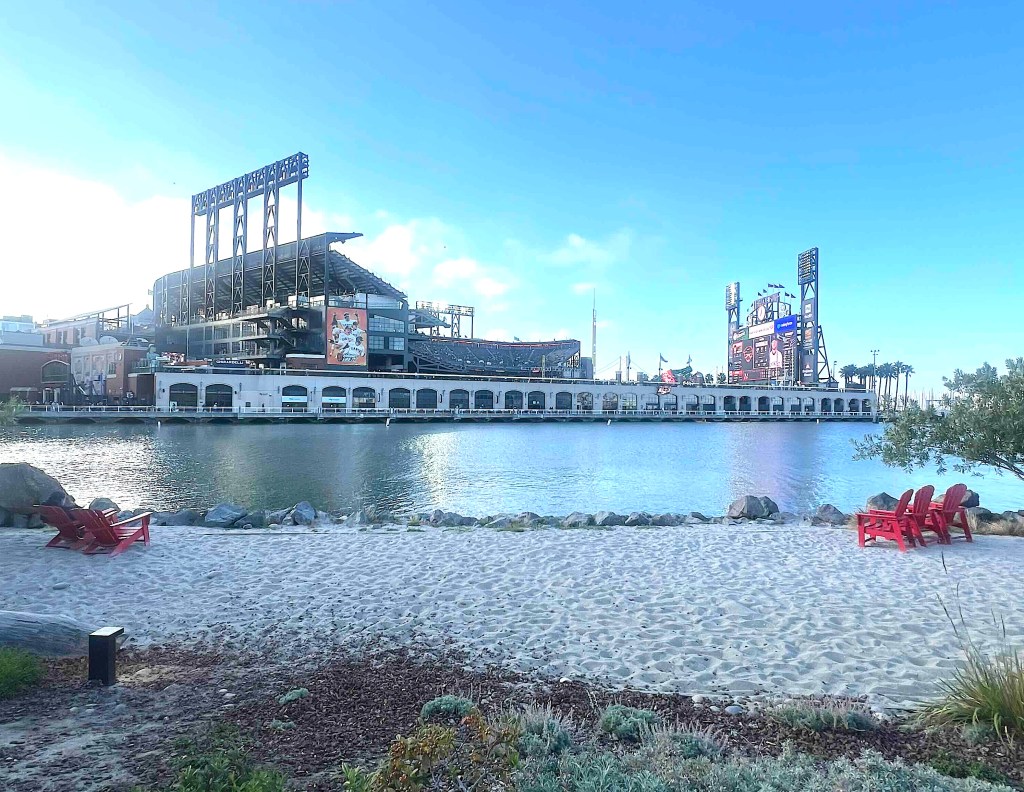Oracle Park in San Francisco viewed from across a body of water. 
