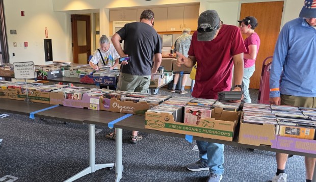 The Friends of the Poway Library's Mega Summer Book and Media Sale included movies and music. (Julie Gallant)