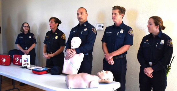 Among those from San Diego Fire-Rescue at the July 24 ceremony to honor the RB Swim & Tennis Club lifeguards were PAD Program Manager Maureen O'Connor, Assistant Chief Becky Newell, Capt. Nima Biganeh and firefighters Caden McCormies and Emily Quinlivan. (Elizabeth Marie Himchak)