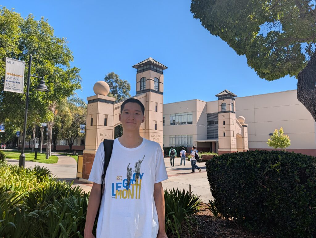 A student standing on a college campus in San Jose, California