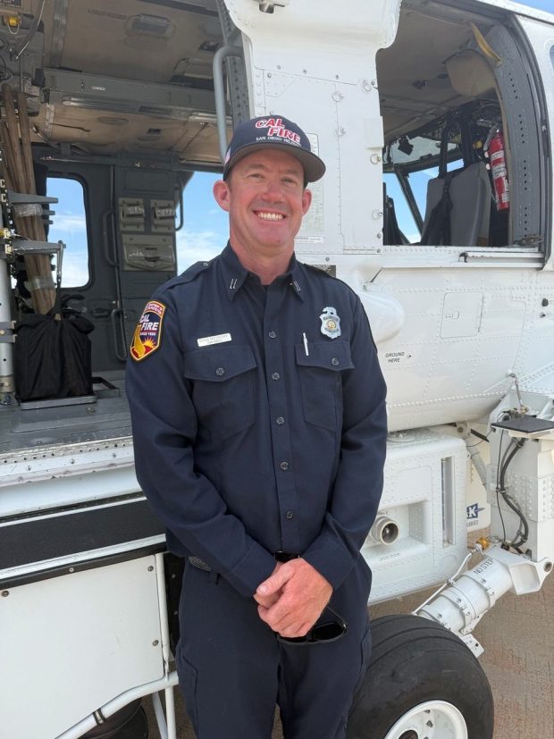 Ryan McCrory, a fire captain on the Sikorsky S-70 CalFire Hawk, said the copters can hold 1,000 gallons of water and have increased speed over previous copters. (Regina Elling)