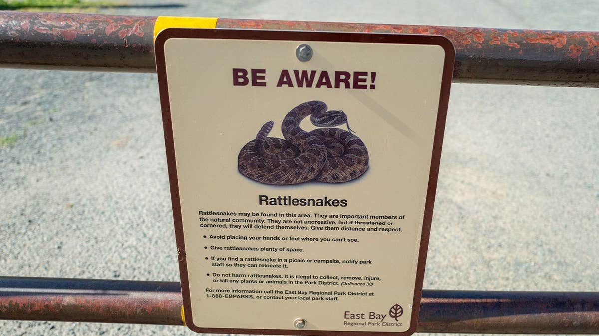 Rattlesnake warning sign posted at a California regional park