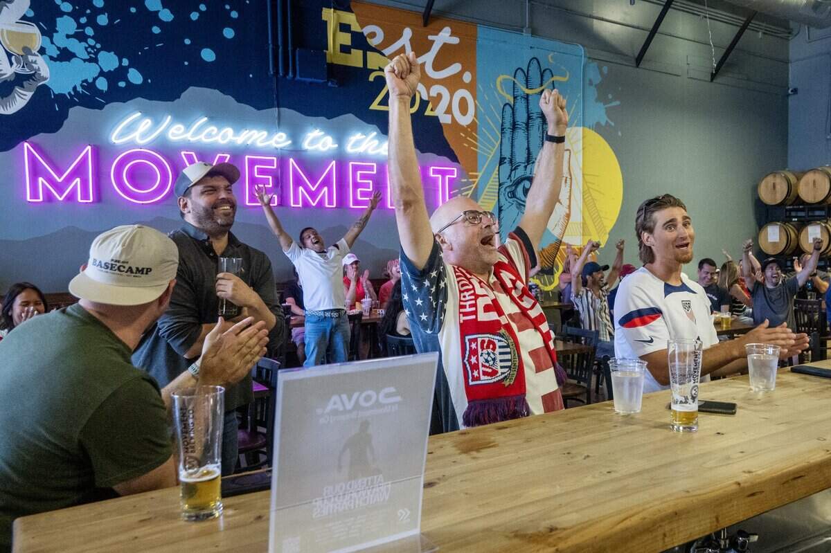Morgan Lehman, center, reacts after a USA goal during the World Cup match against Australia at a watch party at Movement Brewery on Friday, June 19, 2026, in Rancho Cordova.