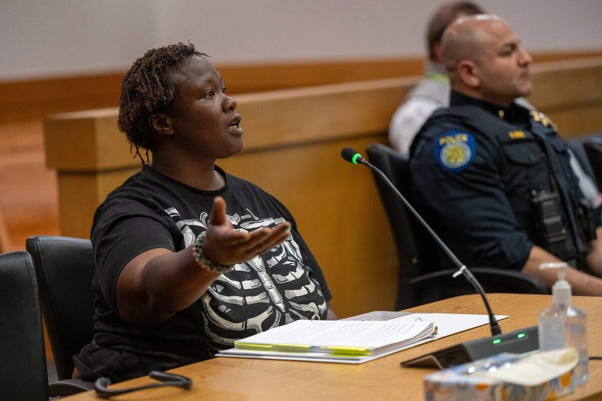 Elizabeth Williams, 38, who is homeless, answers questions from Judge Stephen Lau during a hearing over a small claims lawsuit she has against the city at the Carol Miller Justice Center in Sacramento on March 25. Williams claims the city twice threw away her tent, computer, and medication during encampment sweeps—all items she needed to survive.