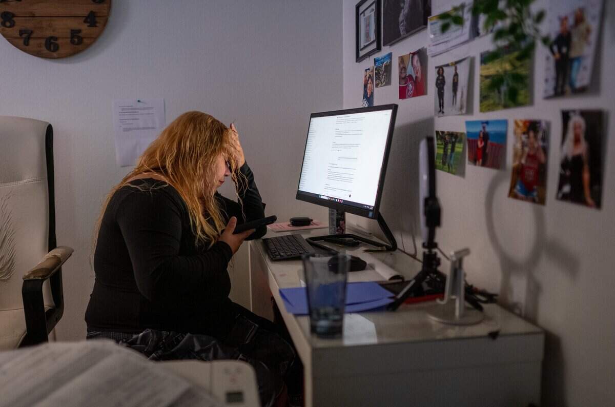 Jocelyn Wright becomes emotional while talking with her caseworker at Turning Point Community Programs on July 10 — the third day of a preliminary eviction notice. That morning, she called out of work because she was overwhelmed by the threat of eviction. Her employer fired her.