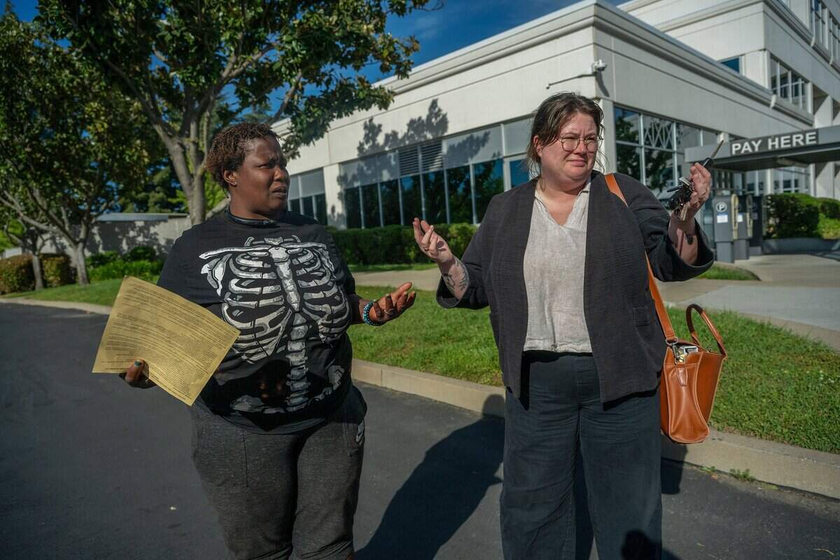 Elizabeth Williams, and Tori Larett, right, staff attorney for the Homeless Advocacy Clinic, leave the Carol Miller Justice Center in Sacramento on Wednesday, March 25, 2026.