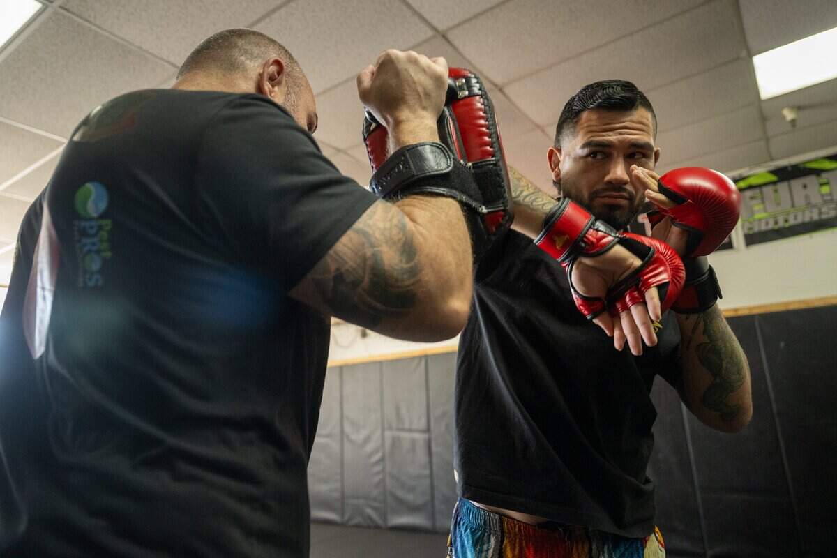 UFC middleweight mixed martial artist Anthony "Fluffy" Hernandez trains with coach Thomas Fallon at Thomas Fallon's Mixed Martial Arts in Citrus Heights on July 16.