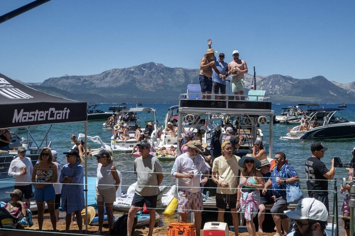 Fans watch golfers at the 17th tee during the American Century Championship at Edgewood Tahoe Golf Course in Stateline, Nev., on Friday, July 10, 2026.