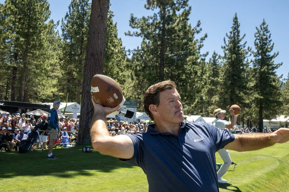 Fox News anchor Bret Baier engages with fans as he plays catch before hitting off the 17th tee during the American Century Championship at Edgewood Tahoe Golf Course in Stateline, Nev., on Friday, July 10, 2026.
