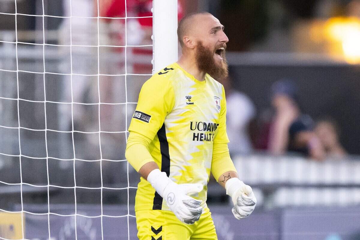 Republic FC goalkeeper Danny Vitiello cheers after a teammate steals the ball from a Rhode Island FC player during a match in Sacramento on Wednesday.