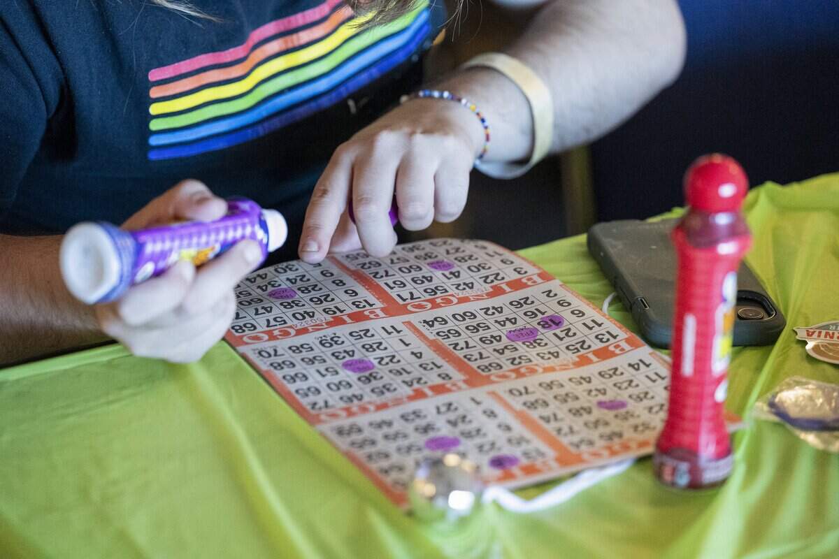 An attendee of Drag Queen Bingo marks their bingo card at the California State Fair in Sacramento on Saturday, July 25, 2026.