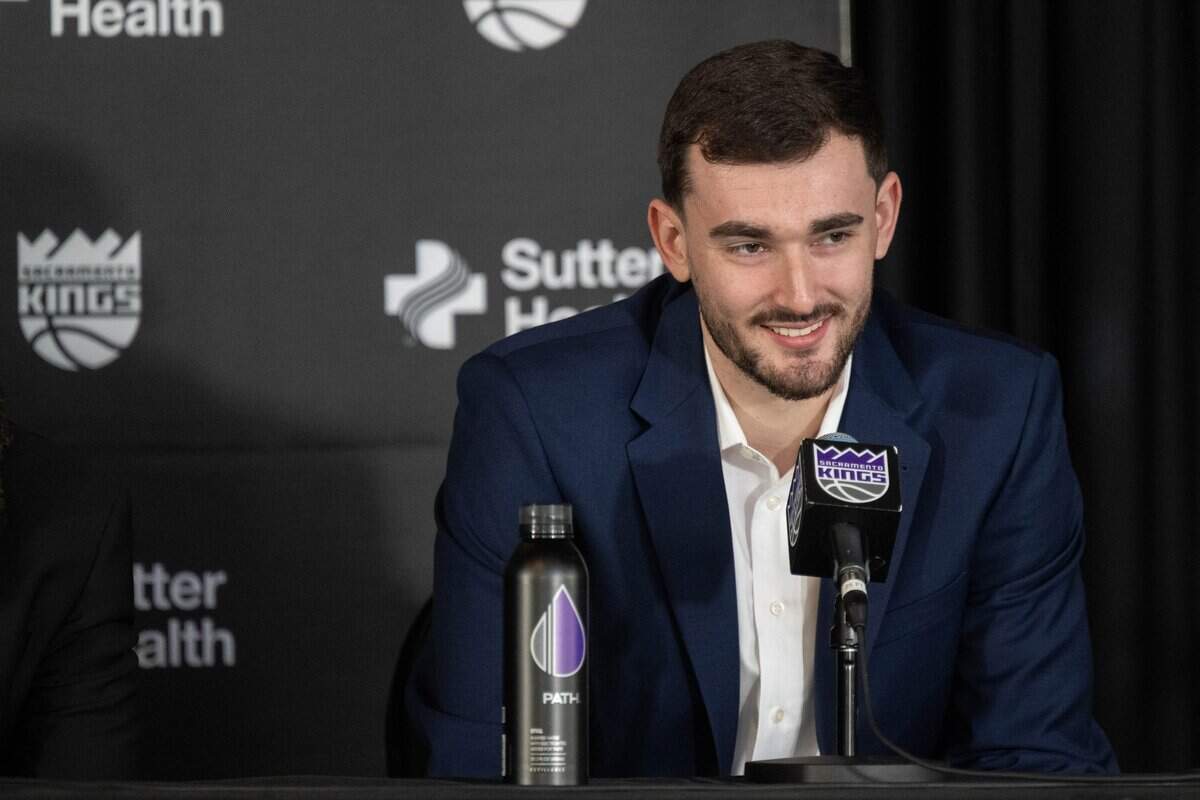 Sacramento Kings 2026 NBA draft pick Alex Karaban listens to a question during an introductory news conference at Golden 1 Center in Sacramento on Monday, June 29, 2026.