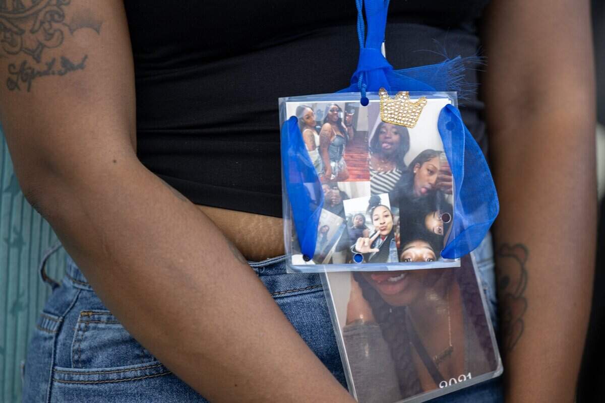 Johntezha Alexander wears a lanyard bearing images of her sister, Johntaya Alexander, during a news conference outside the Tani G. Cantil-Sakauye Sacramento County Courthouse in Sacramento after a judge declared a mistrial in the K Street mass shooting trial on Tuesday, July 21, 2026.