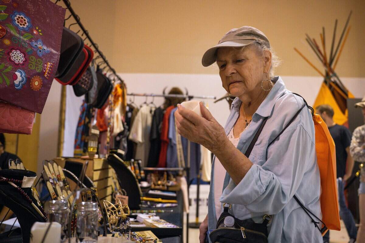 A visitor checks out a souvenir at the California First Peoples Art Showcase at California State Fair at Cal Expo in Sacramento on Friday, July 24, 2026.