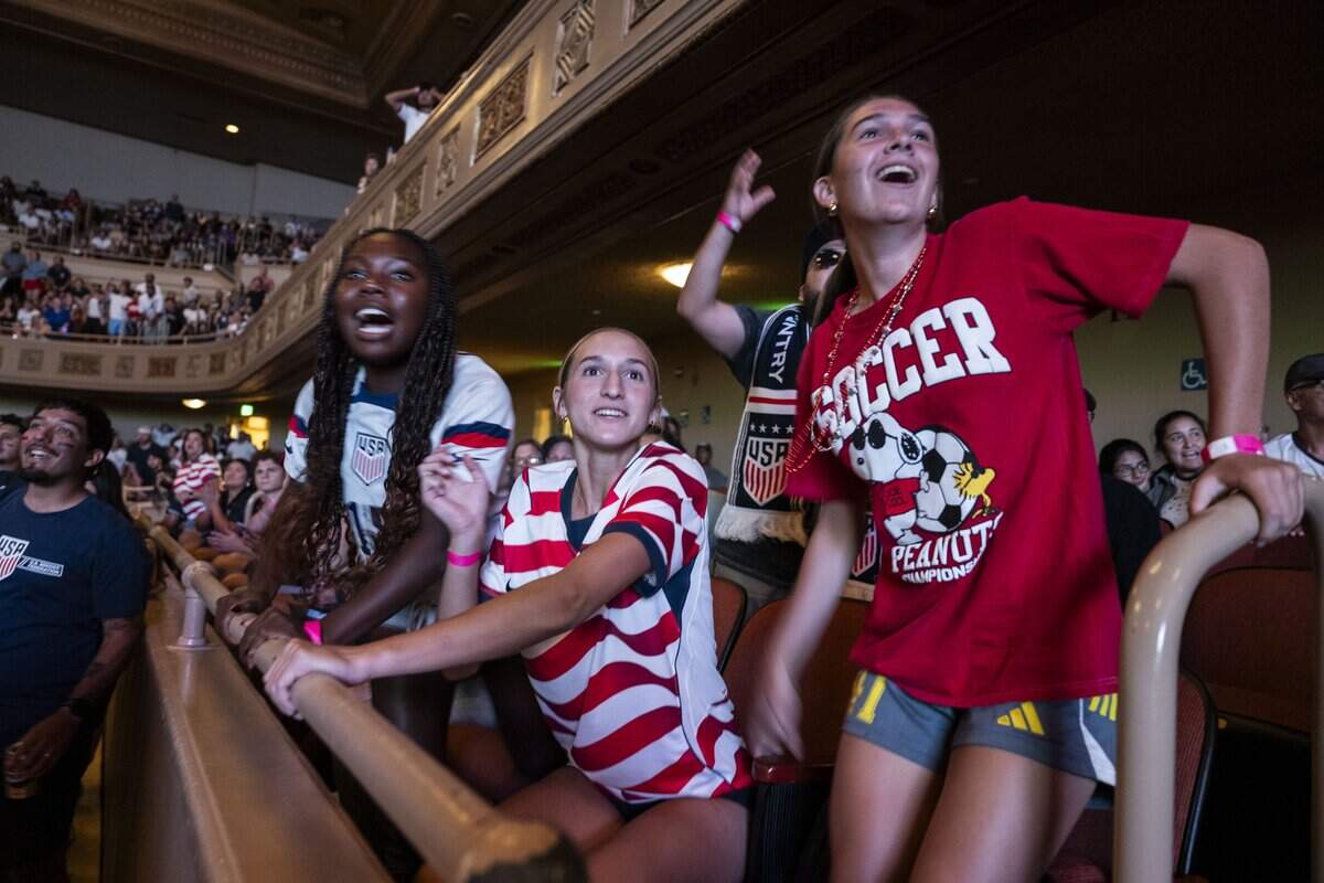 Lucy Hoffman, Keira Taylor and Evie Reid, all of Placer United Soccer Club, react to a play as they attend a watch party for the FIFA World Cup match between the United States and Belgium at Memorial Auditorium in Sacramento on Monday, July 6, 2026. The United States lost 4-1.