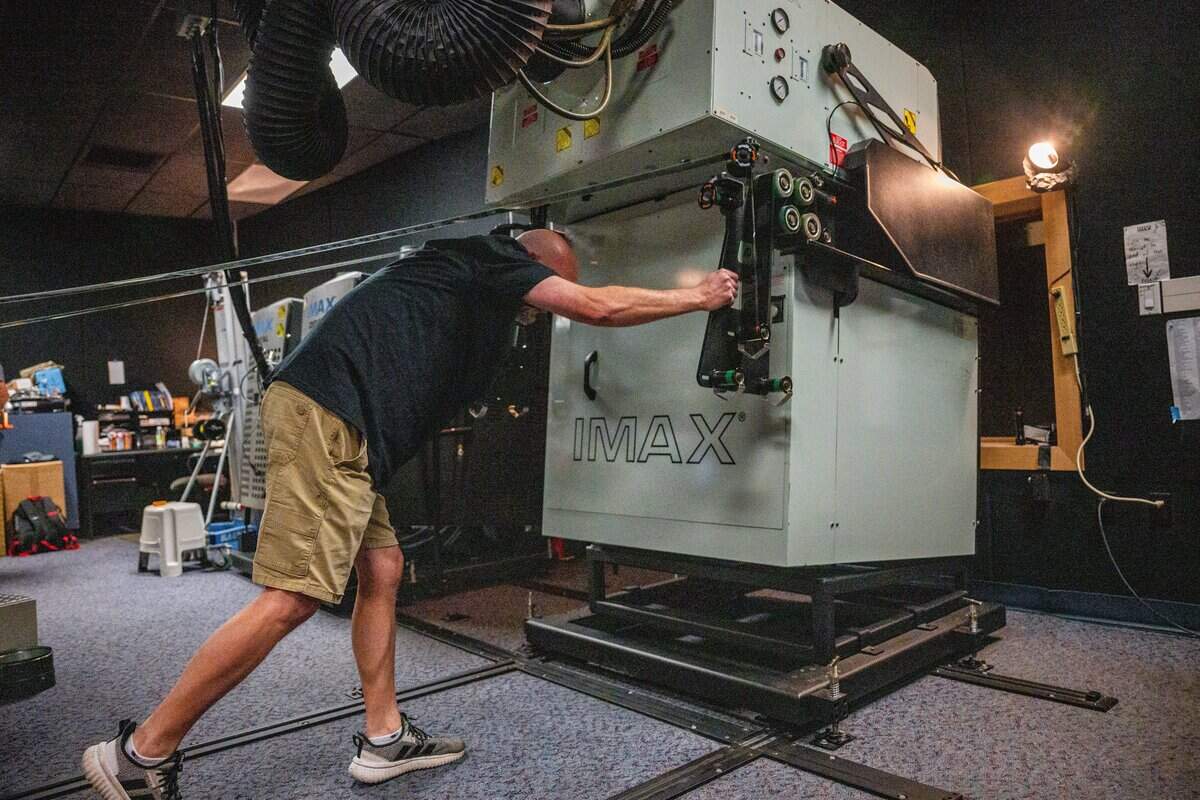 IMAX projectionist Chris Tyson prepares for the showing of Christopher Nolan’s new movie “The Odyssey” at Esquire IMAX Theatre in Sacramento on Friday, July 17, 2026.