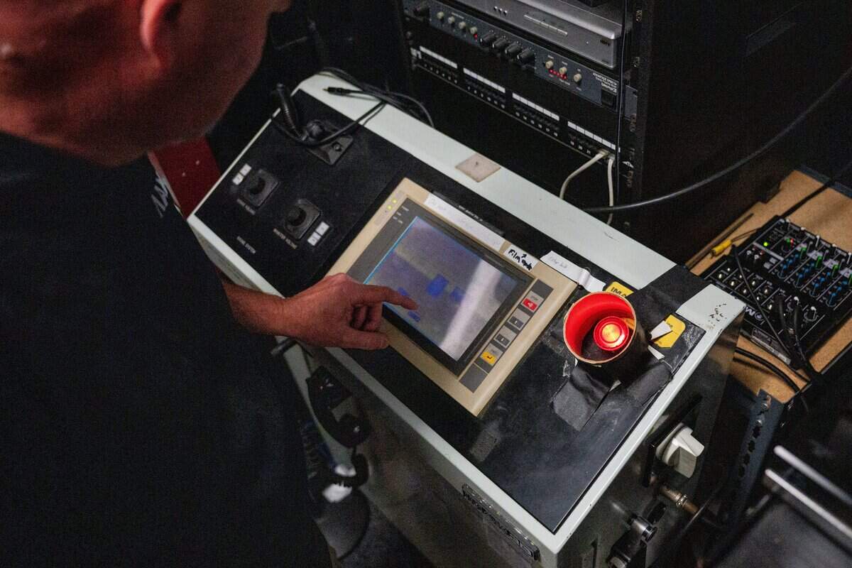 IMAX projectionist Chris Tyson prepares for the showing of Christopher Nolan’s new movie “The Odyssey” at Esquire IMAX Theatre in Sacramento on Friday, July 17, 2026.