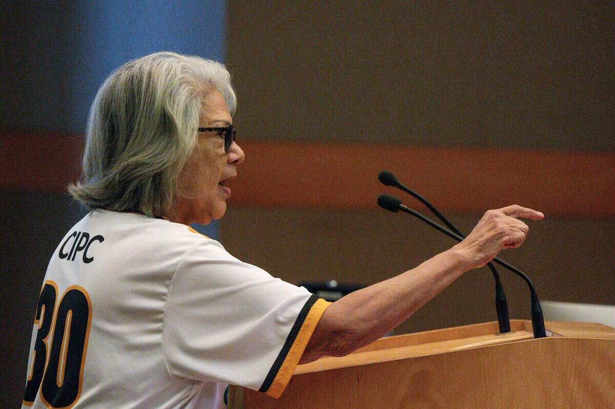 Sacramento resident Yolanda Villanueva speaks in opposition to an expansion of a special Railyards tax financing district at a meeting of the Railyards Public Financing Authority at City Hall on Tuesday.