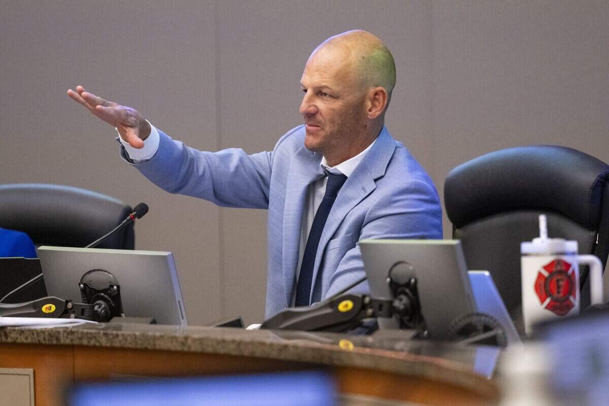 Mayor Kevin McCarty calls for decorum during a Sacramento City Council meeting on Tuesday. McCarty called for a break after some audience members disrupted the meeting with chants.