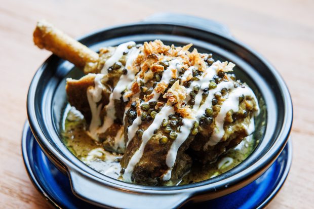 A plate of braised Kashmiri Rogan Josh lamb shank and fried lentils is pictured at Asia Live, a new restaurant in the Westfield Valley Fair mall in Santa Clara, Calif., on Wednesday, June 24, 2026. (Dai Sugano/Bay Area News Group)