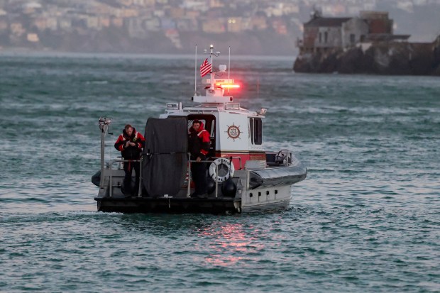 A San Francosco Fire Department boat continues to search for three missing individuals after a pontoon boat capsized on July 14, 2026 in San Francisco, California. 16 people were rescued while three remain missing. One death has been reported. (Photo by Heather Diehl/Getty Images)