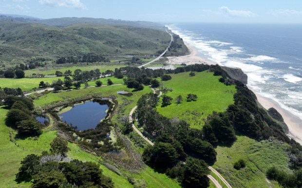A drone view of the San Gregorio Ranch Beach, right, and land in San Gregorio, Calif., on Wednesday, April 16, 2025. In the background is San Gregorio State Beach. The Peninsula Open Space Trust is purchasing the 195-acre ranch property for $10 million. (Jane Tyska/Bay Area News Group)