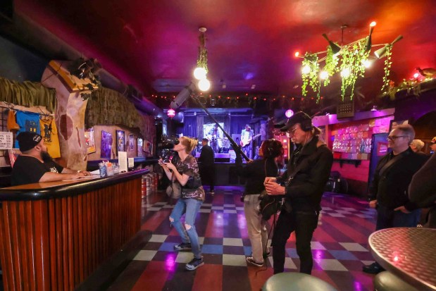 A film crew consisting of Sherri Kauk, center, Emily Martinez Robles, and Thayer Walker document the interior of the Bottom of the Hill music venue in San Francisco, Calif., on Thursday, June 18, 2026. Filmmakers Chris Boone and Kevin Smokler are producing a documentary film about the legendary independent San Francisco club that is closing at the end of the year. (Ray Chavez/Bay Area News Group)