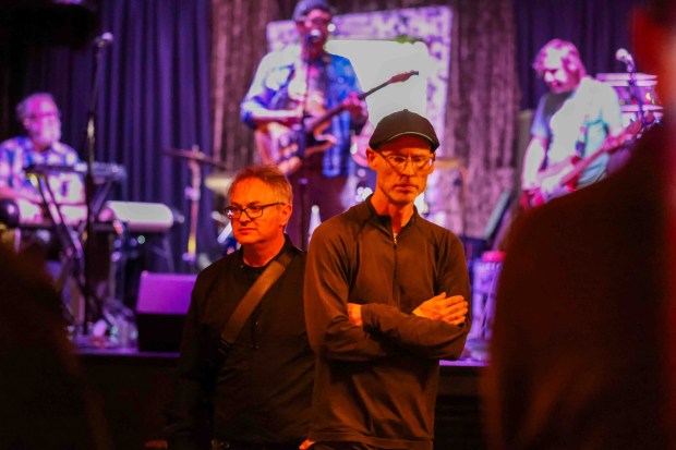 Filmmakers Kevin Smokler, left, and Chris Boone look on as their crew documents the interior of the Bottom of the Hill music venue in San Francisco, Calif., on Thursday, June 18, 2026. The filmmakers are producing a documentary film about the legendary independent San Francisco club that is closing at the end of the year. (Ray Chavez/Bay Area News Group)