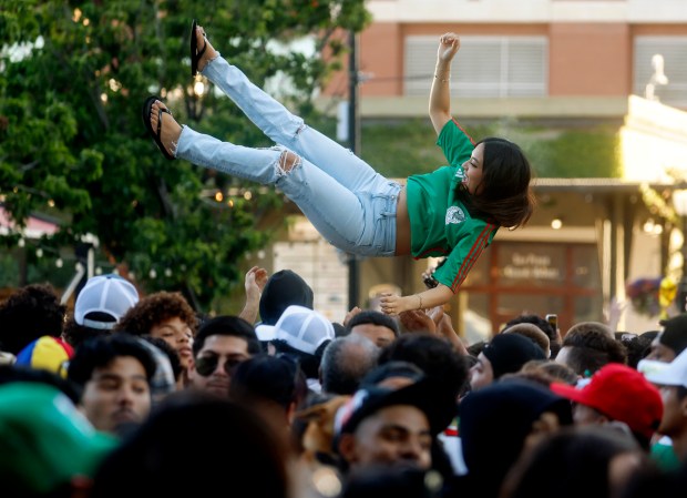 A Mexico soccer fan is tossed in the air during a watch party for Mexico versus Czechia in the second half for the FIFA World Cup at the Soccer Celebration presented by El Camino, hosted by the San Jose Earthquakes and San José Sports Authority at San Pedro Square in downtown San Jose, Calif., on Wednesday, June 24, 2026. (Nhat V. Meyer/Bay Area News Group)
