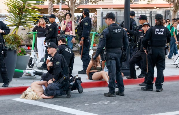 San Jose Police Department officers detain people after the Mexico versus Czechia game for the FIFA World Cup at the Soccer Celebration presented by El Camino, hosted by the San Jose Earthquakes and San José Sports Authority at San Pedro Square in downtown San Jose, Calif., on Wednesday, June 24, 2026. (Nhat V. Meyer/Bay Area News Group)