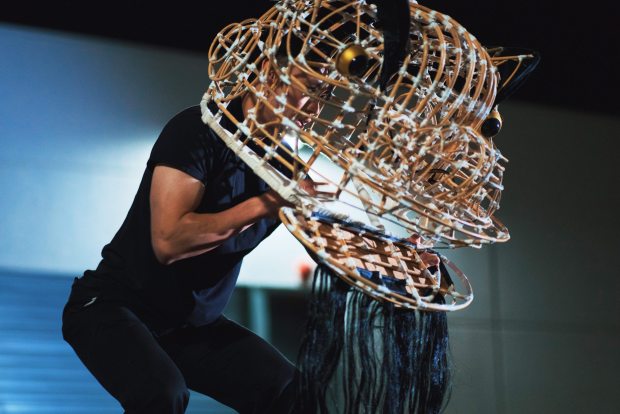 Sun Hing team leader Kevin Nguyen demonstrates movements with an uncovered bamboo lion head practice frame, allowing team members to better observe his technique, Friday, April 17, 2026, in San Jose, Calif. (Photo by Yu Wang)