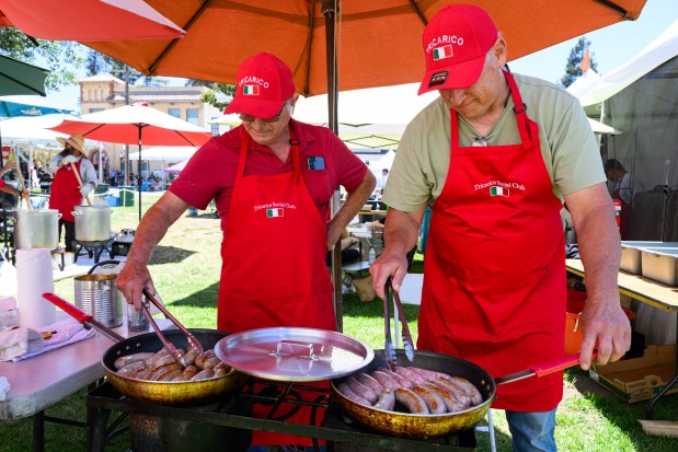 Louis Morrone, of San Jose, from left, and Rick Martin, of Morgan Hill, grill Italian sausages during the 44th annual Italian Family Festa held at History Park in San Jose, Calif., on Saturday, July 25, 2026. The event is hosted by the Italian American Heritage Foundation. (Jose Carlos Fajardo/Bay Area News Group)