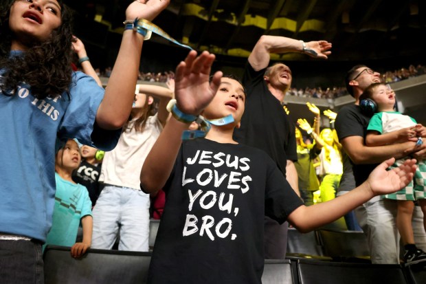 Fans sing along with Forrest Frank during a Christian music concert at Oakland Arena in Oakland, Calif., on Tuesday, July 14, 2026. (Ray Chavez/Bay Area News Group)
