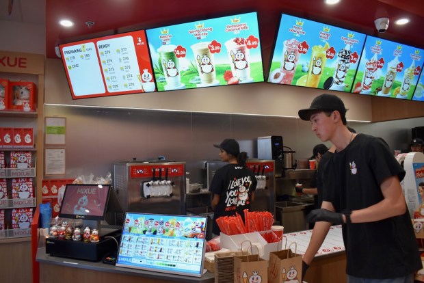 Staff members prepare orders at Mixue in Sunnyvale on July 10, 2026. Mixue, the world's largest fast-food chain by unit, has opened its first Bay Area location in Sunnyvale. (Kate Bradshaw/Bay Area News Group)