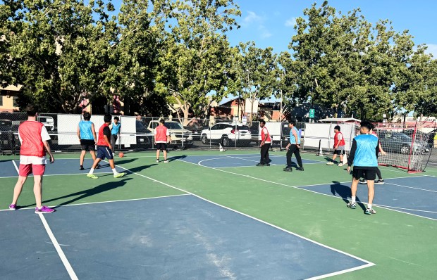 Several people play futsal on the new court at at Club Volo, an outdoor sports hub that opened at the Serpentine Plaza in downtown San Jose on Friday, June 26, 2026. (Sal Pizarro/Bay Area News Group)