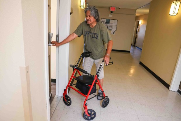 Former unhoused senior Hector Ocampo walks into his room at Casa Esperanza in Redwood City, Calif., Friday, July 17, 2026. (Ray Chavez/Bay Area News Group)
