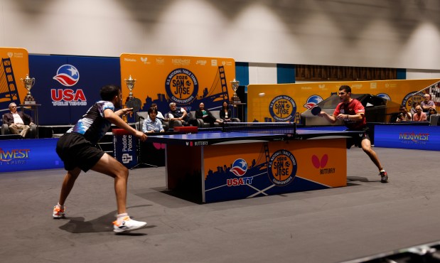 Nikhil Kumar, left, returns the ball against Kanak Jha during the men's singles final for the 2026 U.S. National Table Tennis Championships at the San Jose McEnery Center in San Jose, Calif., on Wednesday, July 8, 2026. (Nhat V. Meyer/Bay Area News Group)