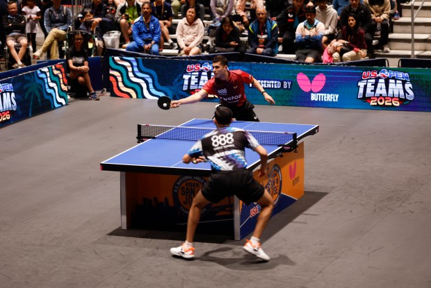Kanak Jha, in red, returns the ball against Nikhil Kumar during the men's singles final for the 2026 U.S. National Table Tennis Championships at the San Jose McEnery Center in San Jose, Calif., on Wednesday, July 8, 2026. (Nhat V. Meyer/Bay Area News Group)