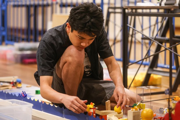 Zane Chattra, of Washington, works on The Tech Topple: The Great Adventure at The Tech Interactive in San Jose, Calif., on Thursday, July 16, 2026. (Shae Hammond/Bay Area News Group)