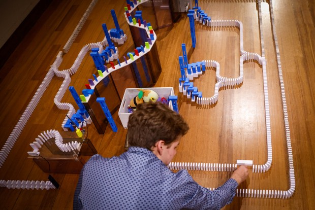 Brady Dolan, of Ann Arbor, Michigan, works on The Tech Topple: The Great Adventure at The Tech Interactive in San Jose, Calif., on Thursday, July 16, 2026. (Shae Hammond/Bay Area News Group)